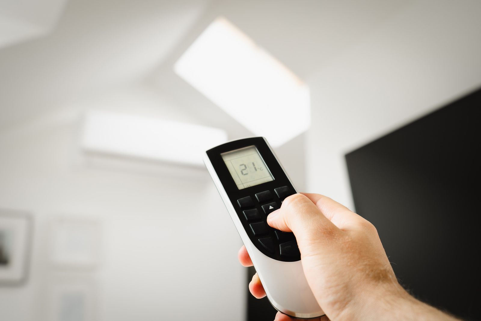 Adjusting an air conditioner with a remote control