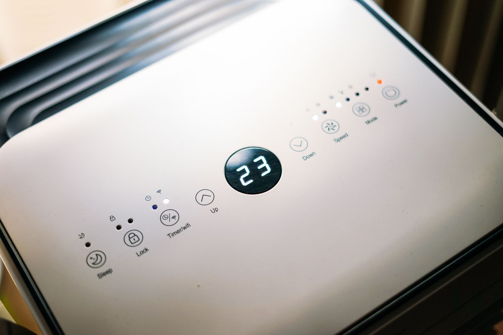 Air conditioning control panel showing the set temperature
